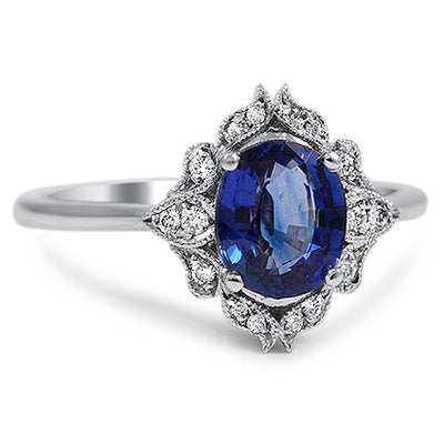 Lovely Blue Sapphire Ring With White Diamond Accents - ZeeDiamonds