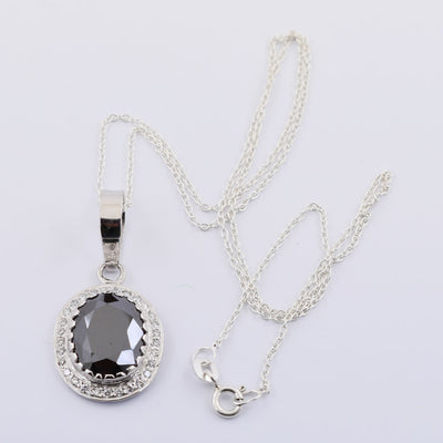 4.5 Ct Oval Faceted Black Diamond Pendant with White Diamond Accents - ZeeDiamonds