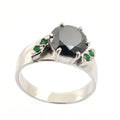 3 Carats Round Shape Black Diamond Ring With Emerald Accents - ZeeDiamonds