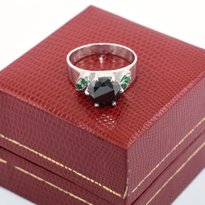 3 Carats Round Shape Black Diamond Ring With Emerald Accents - ZeeDiamonds